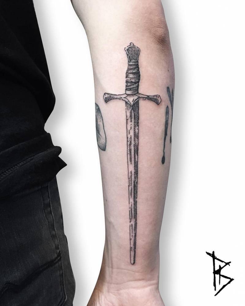Woodcut style sword tattoo