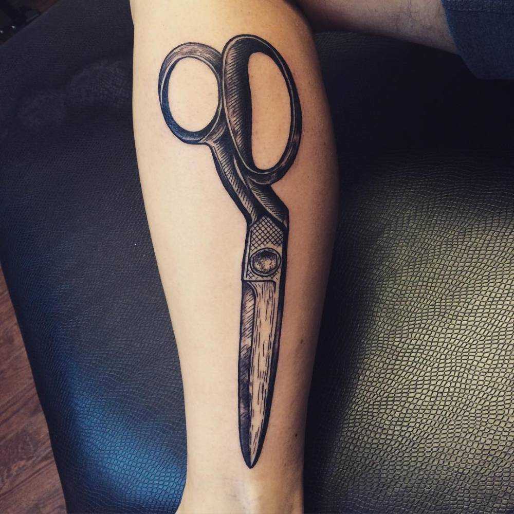 Woodcut style scissors tattoo