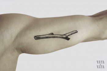 Wooden stick tattoo