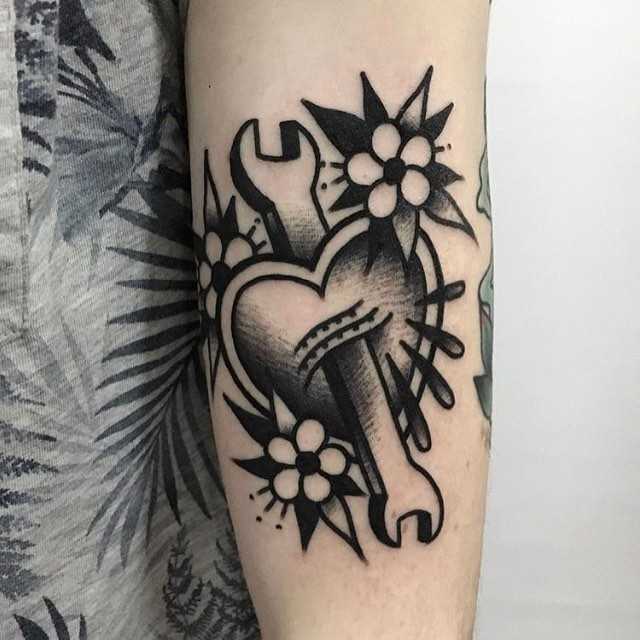 Wrench and heart tattoo by jeroen van dijk