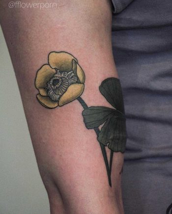 Yellow water lily tattoo