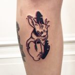A glitchy jackalope tattoo