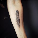 Archaeopteryx feather tattoo