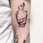 Black and grey antique bust tattoo