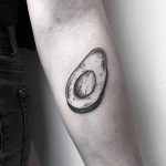 Black and grey avocado tattoo