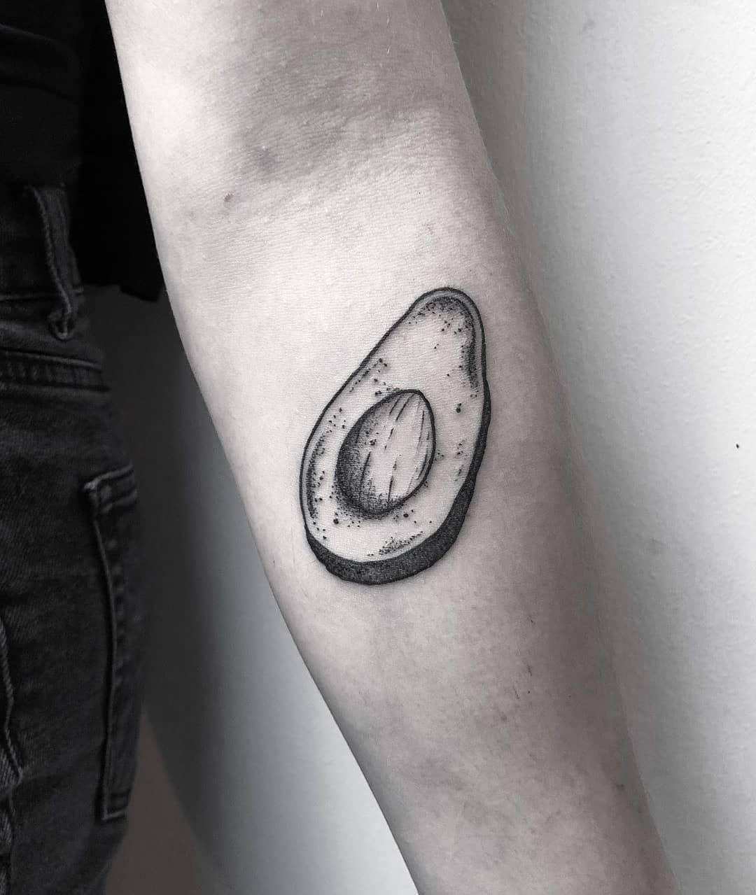 Black and grey avocado tattoo