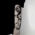 Black rose tattoo by Judy