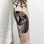 Black snake head tattoo