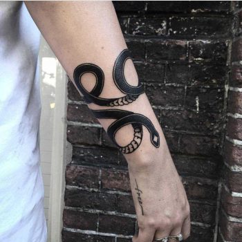 Black snake tattoo by Andre Castcovil