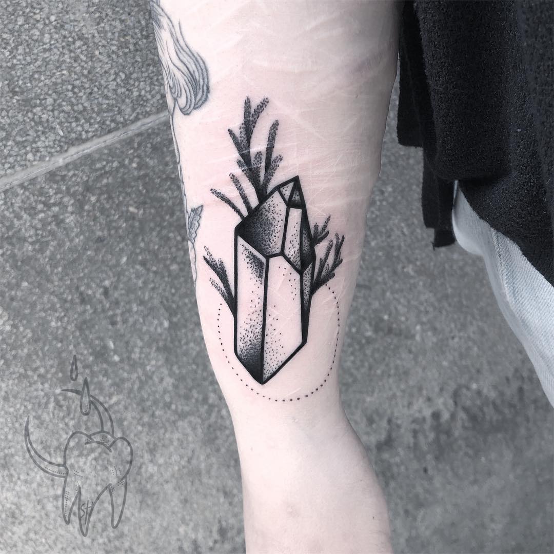 Blackwork crystal and branch tattoo