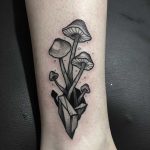 Blackwork magic mushrooms tattoo