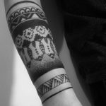 Blackwork pattern tattoo on the forearm