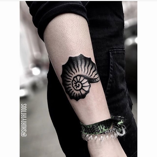 Blackwork shell tattoo by ana