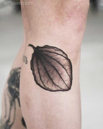 Broadleaf tattoo on the shin