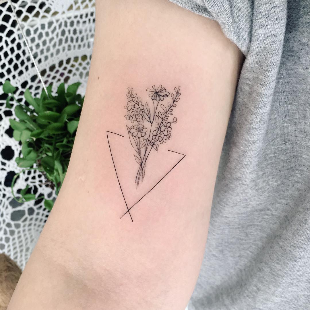 Child’s birht mark flower bouquet tattoo