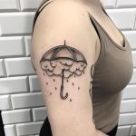 Cloudy umbrella tattoo done at Kult Tattoo Fest