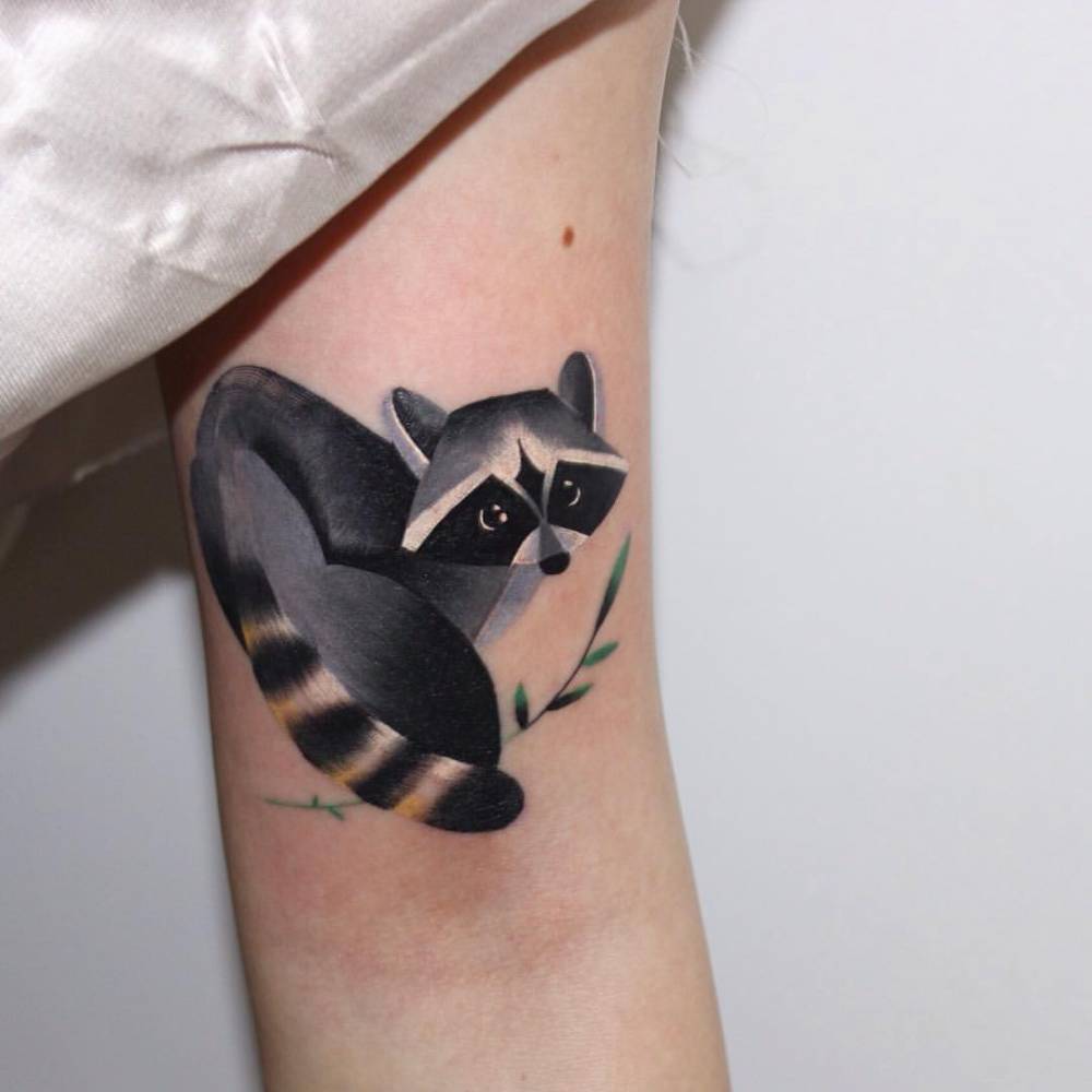 Colorful raccoon tattoo