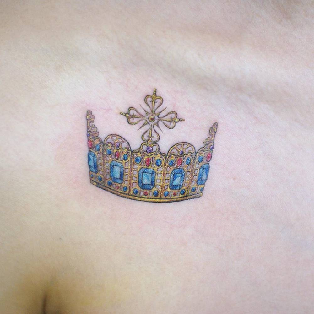 Crown tattoo on the chest