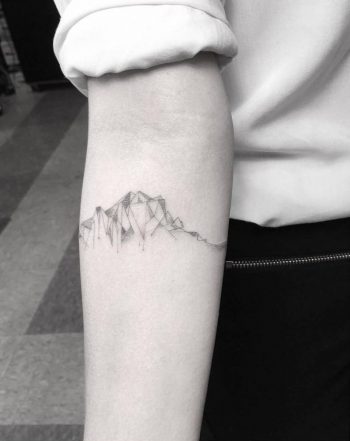 Cubist mountain range tattoo