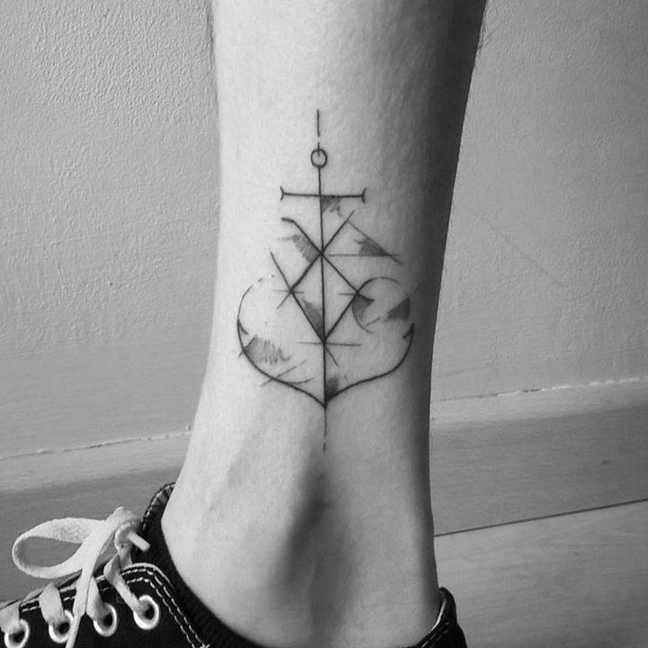 Custom anchor tattoo on the calf