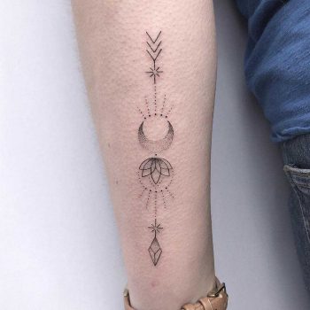 Custom arrow, flower, and moon tattoo