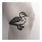 Cute duck tattoo on the knee