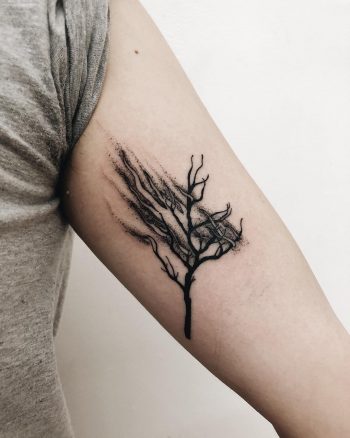 Disappearing tree tattoo