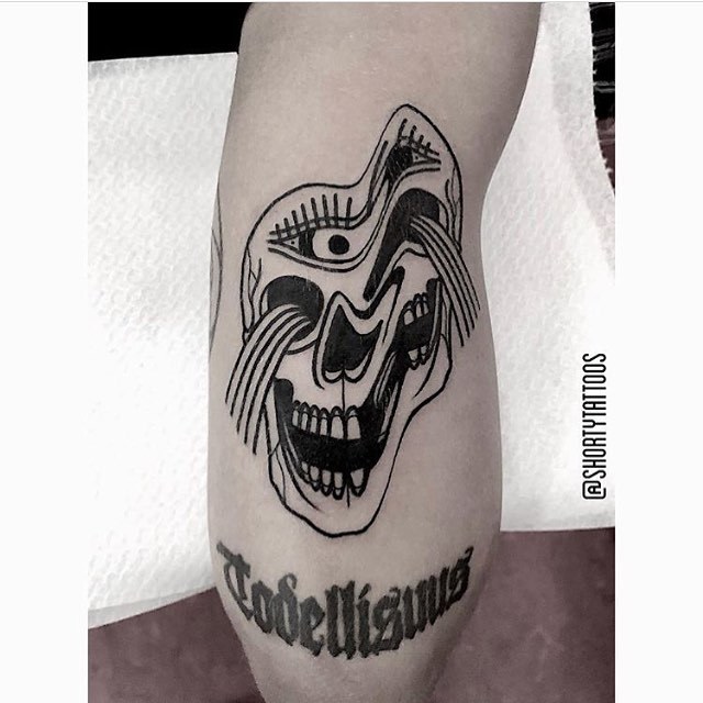 Distorted skull tattoo by Ana