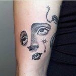Dot-work face tattoo