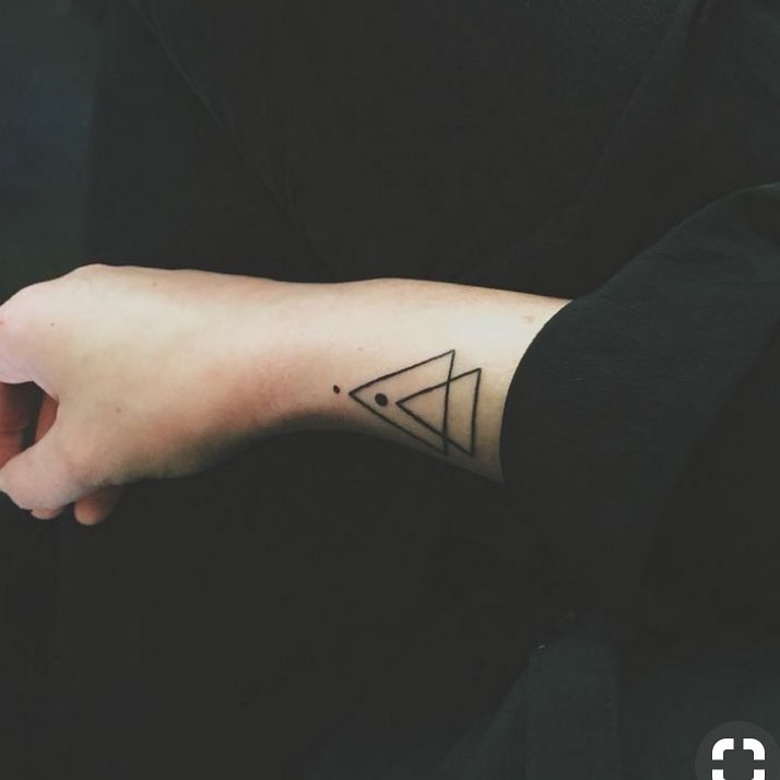 Double triangle and dots tattoo