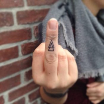 Double triangle tattoo by Christopher Henriksen