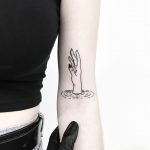 Drowning hand tattoo