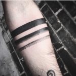 Fading armbands tattoo by Unkle Gregory