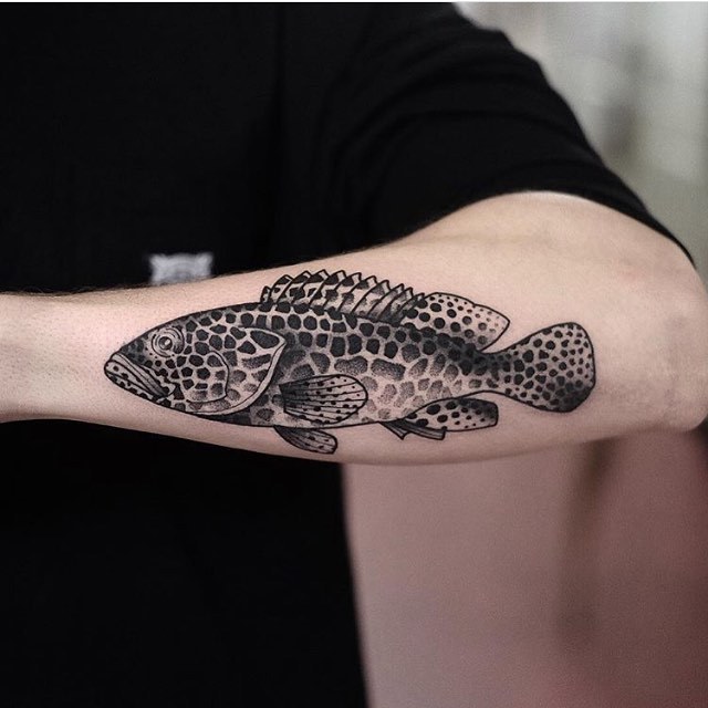 Fish tattoo on the forearm by jonas ribeiro