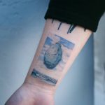 Floating rock tattoo by Sol