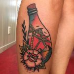 Flower and bottle tattoo by Jeroen Van Dijk