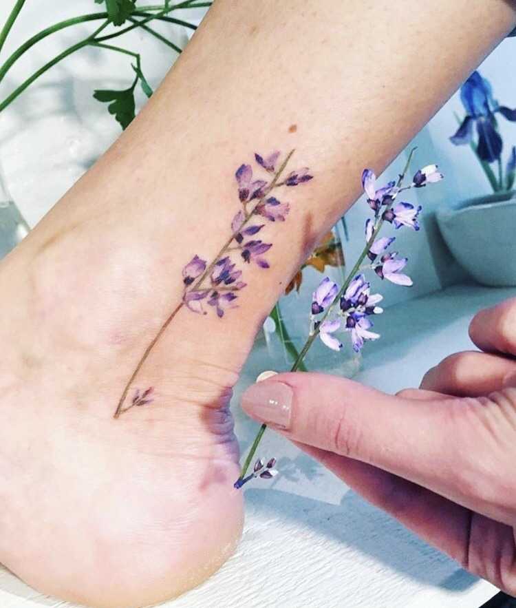 Flower on the ankle by Ritkit Tattoo