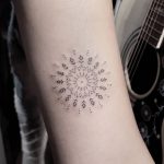 Free-hand mandala tattoo
