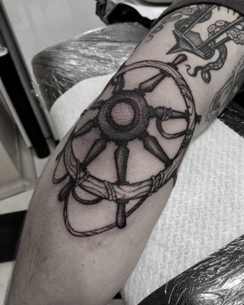 Freehand shipwheel tattoo
