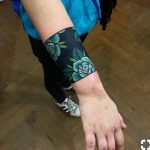 Gorgeous floral armband tattoo