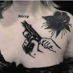 Gun tattoo by Ignacio TTD