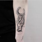 Hand and moon tattoo by Jonas Ribeiro