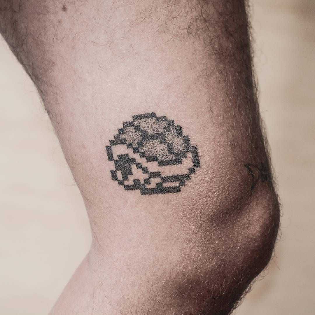 Hand-poked Super Mario turtle tattoo