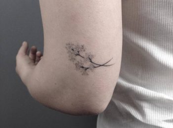 Hand poked baby's breath tattoo