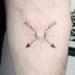 Hand-poked crescent moon and arrows