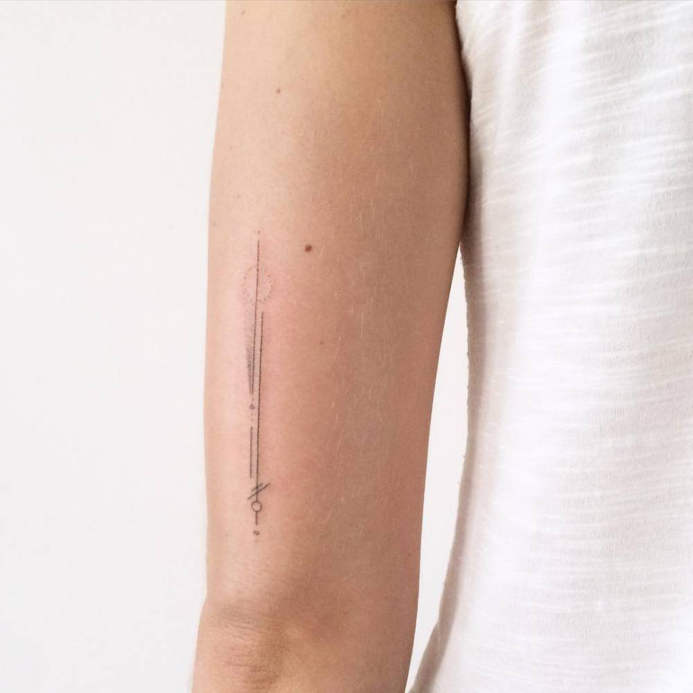 Hand-poked line tattoo