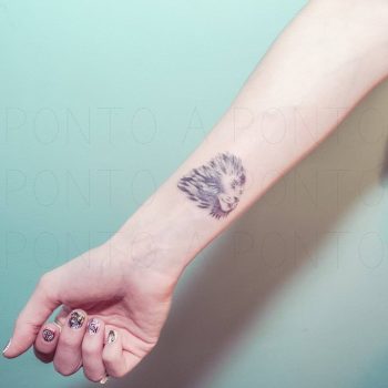Hand poked lion on the wrist
