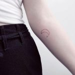 Hand-poked moon by zero zero tattoo