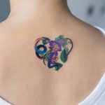 Heart-shaped floral tattoo by Zihee