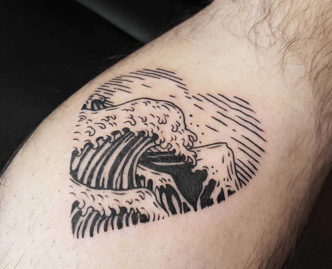 Heart-shaped wave and mountain tattoo